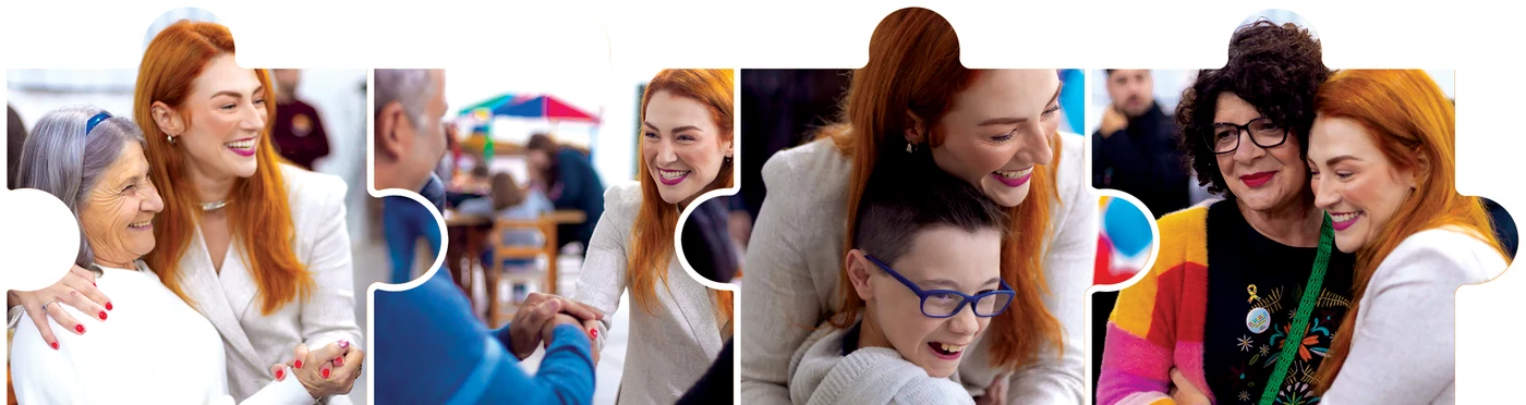 Fran ao lado de famílias e pessoas da comunidade